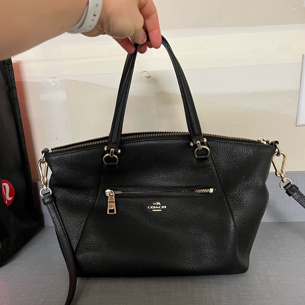 Excellent Condition Black Coach bag with exterior and interior zips.